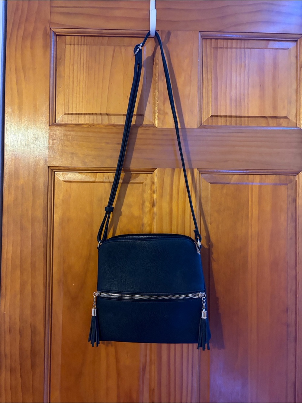 Black Crossbody Bag with Tassel Zipper Accent